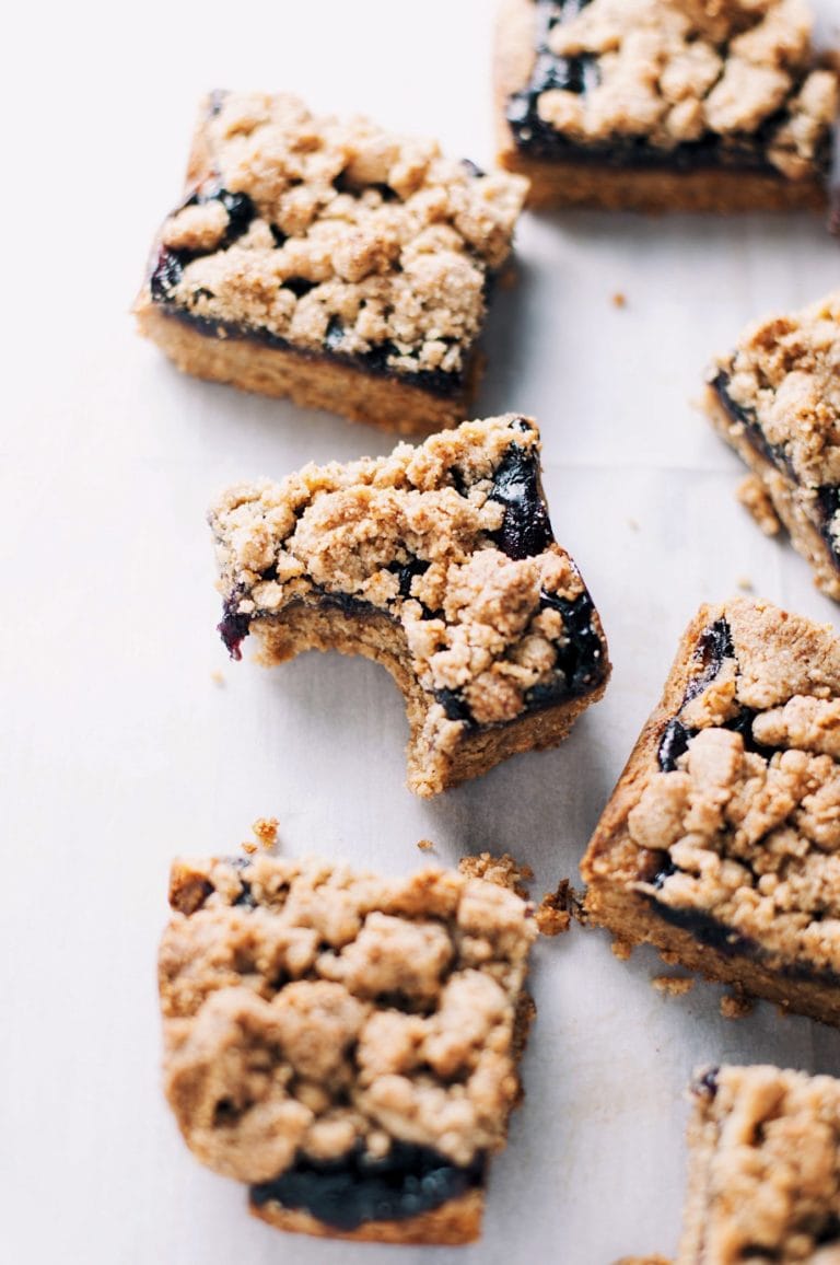 a group of jam bars with a bite out of one