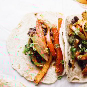 vegetarian fajitas with peppers, onions in a tortilla
